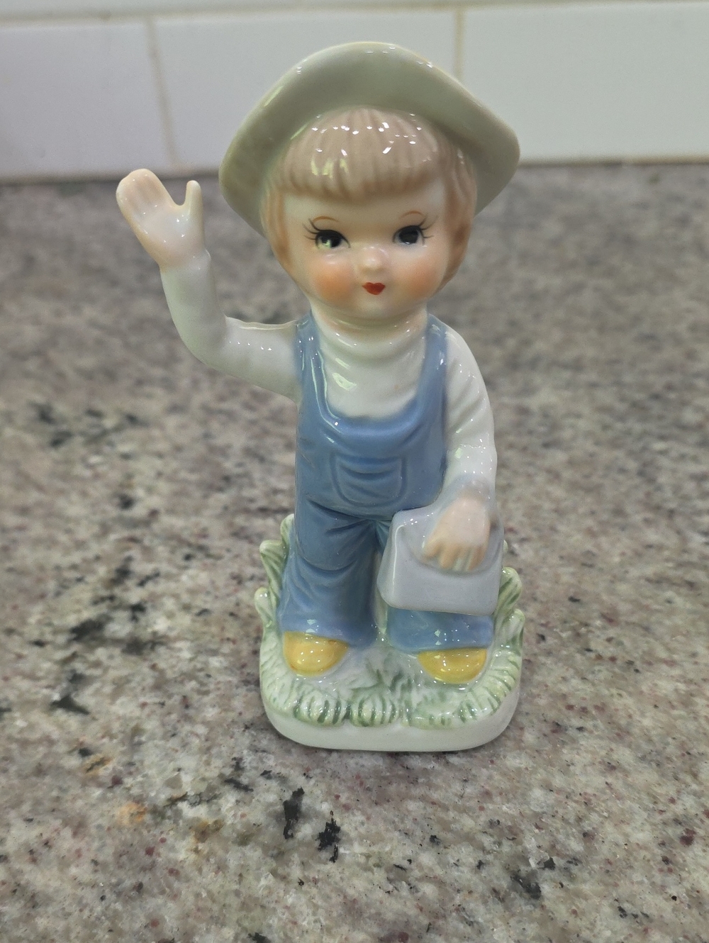 Vintage Porcelain Boy Figurine in Blue Overalls